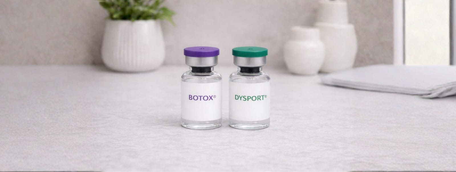 Botox vs Dysport injectable vials side by side with syringe